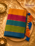Multicolour block stripe mul cotton saree in mustard, magenta, teal, olive green and cobalt blue with gold zari separators and blue orange tassel pallu