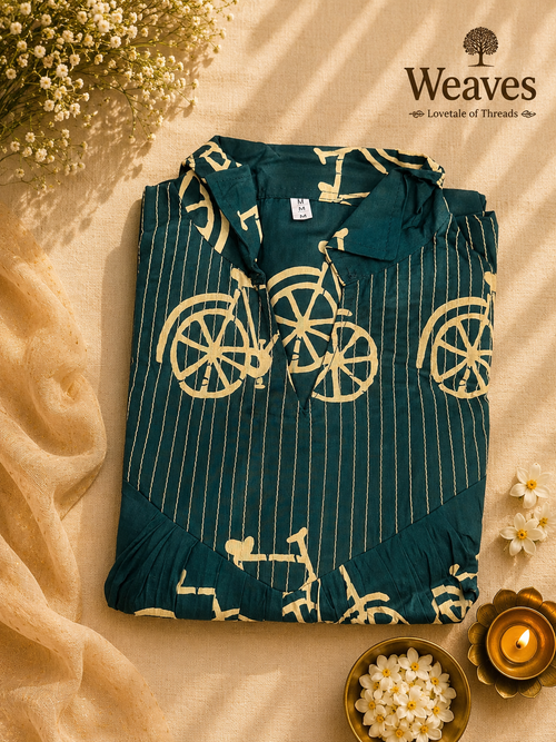 Cotton A-Line Top in teal with gold vintage bicycle and stripe print, flat lay