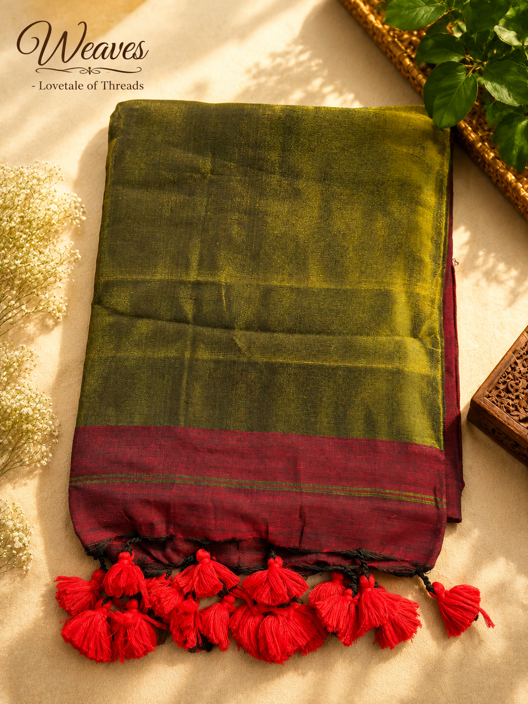 Folded wine soft silk tissue saree with bright red tassels