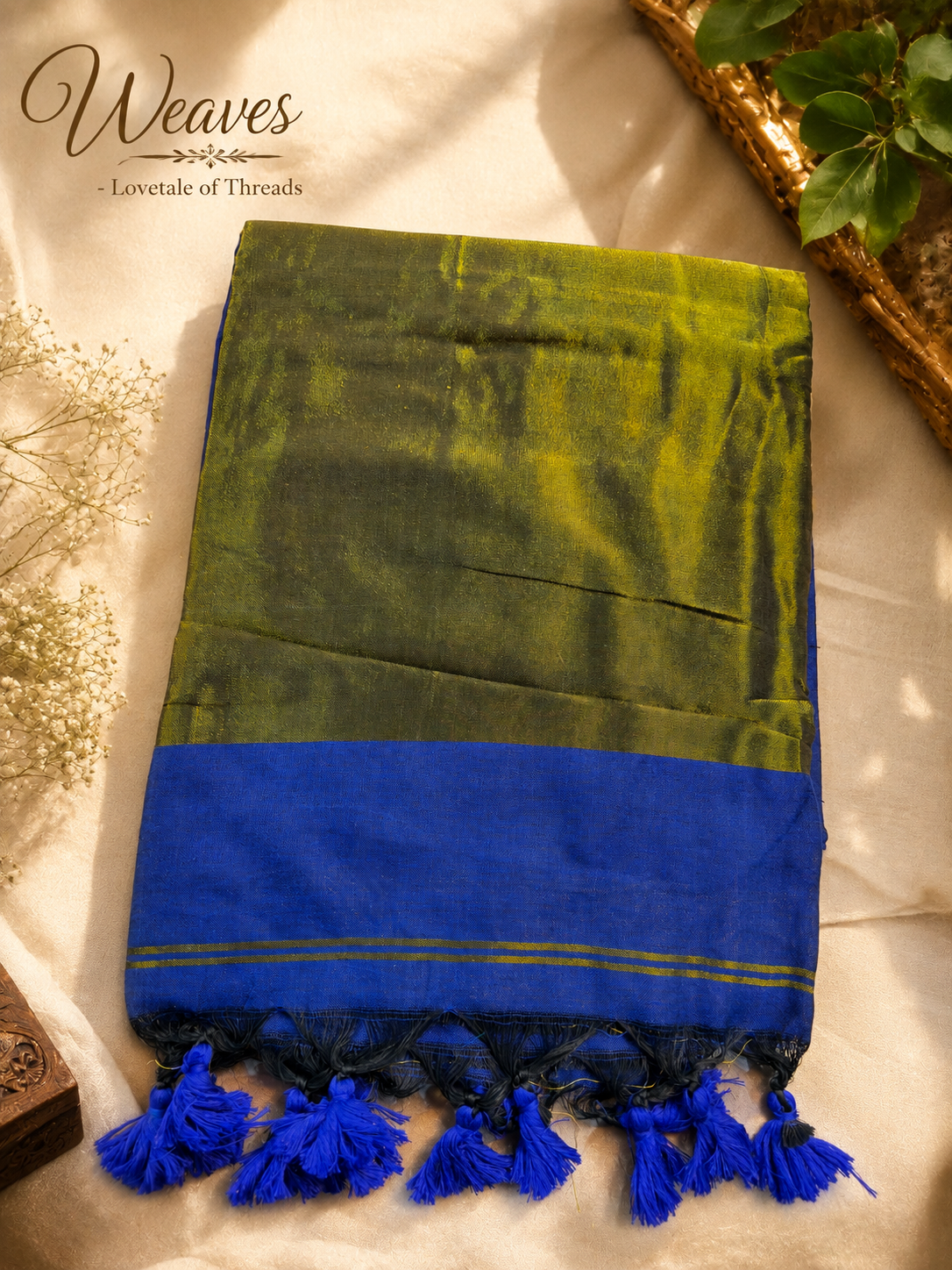 Folded royal blue soft silk tissue saree with blue tassels