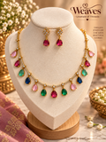 Gold-tone necklace set with multicolour pear-cut teardrop stones and matching earrings
