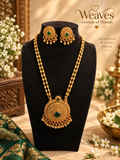 Gold beaded long haram necklace set with maroon centre stone and matching earrings