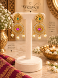 Antique gold floral chandbali earrings with pink and green stones and pearl drops