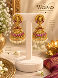 Antique gold Lakshmi temple jhumka earrings with pink kemp stones and pearl drops