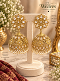 Gold kundan floral jhumka earrings with openwork dome and pearl drop fringe
