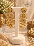Antique gold nagas chandbali earrings with Lakshmi motif, peacocks, and pearl cluster drops