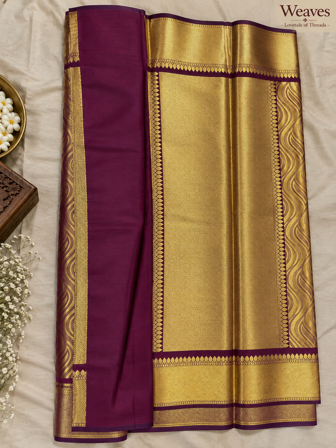 Folded wine Kanchipuram semi silk saree with gold woven border