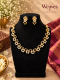 Imitation geometric gold-tone necklace and matching earrings with square-link design and clear stone-style accents