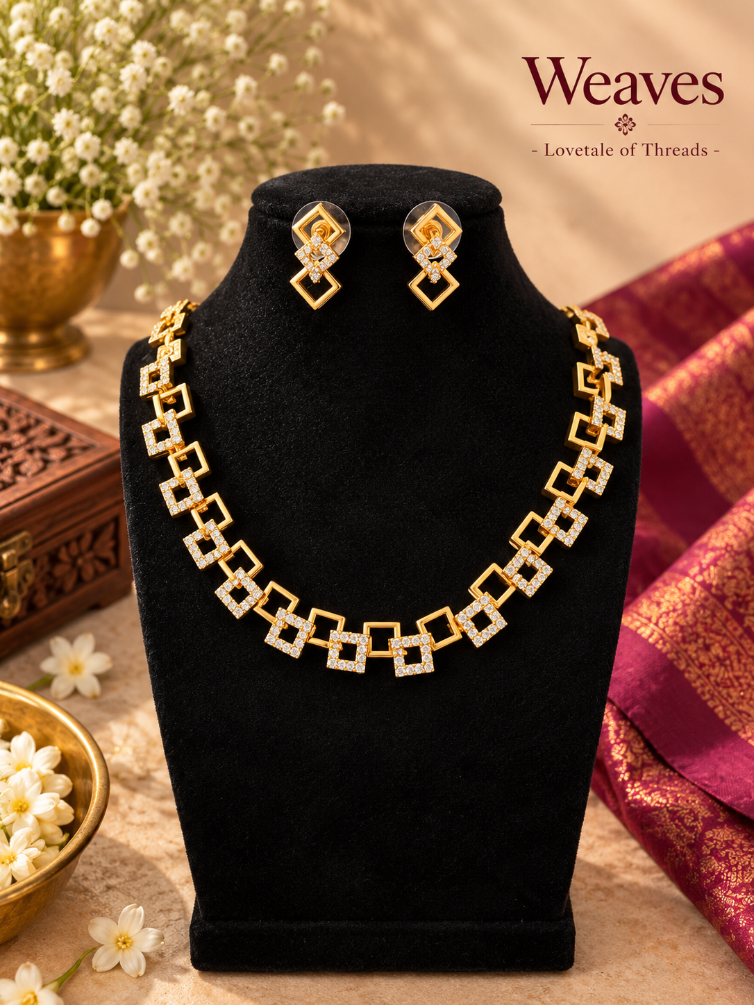 Imitation geometric gold-tone necklace and matching earrings with square-link design and clear stone-style accents