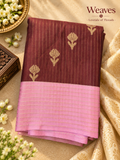Maroon and pink soft silk saree with gold-tone stripes and floral motifs displayed full length