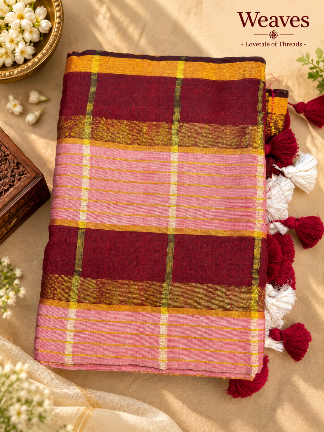 Mul cotton saree with burgundy body, pink checks, mustard-toned stripes, and tassels