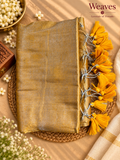 Gold-toned mul cotton saree with mustard tassels and silver-toned cord accents